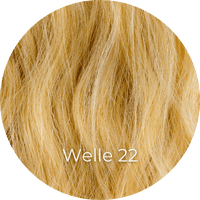 Sandblonde Extensions gewellt